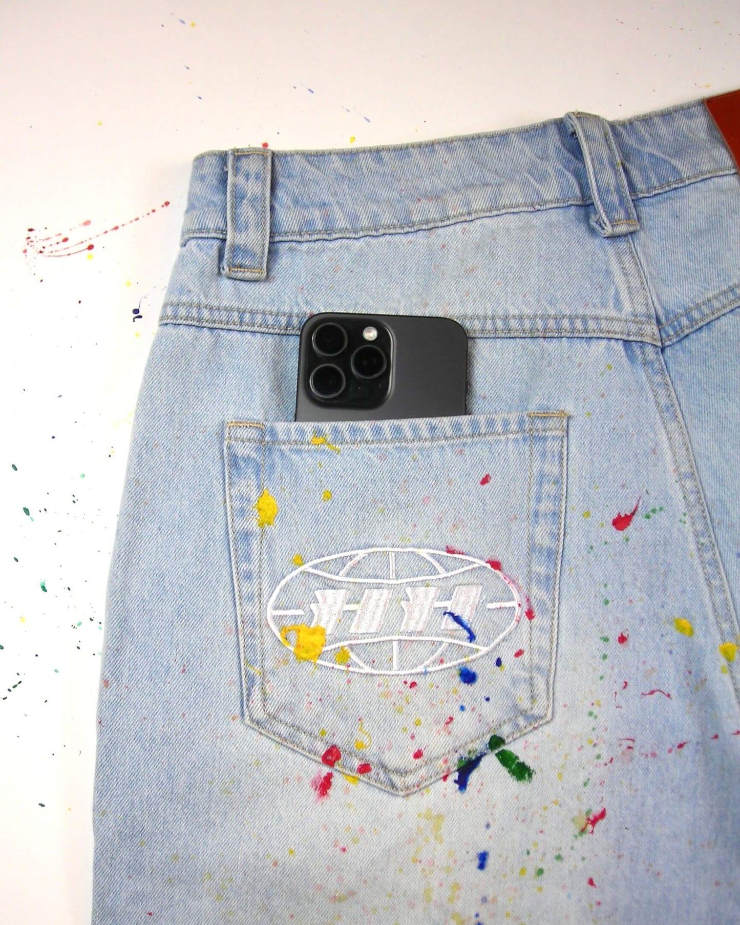 paint splatt denim jeans